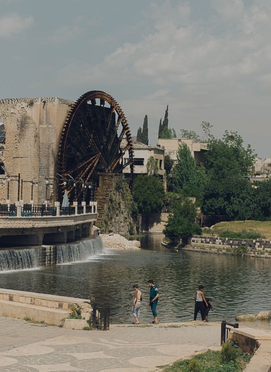 Historic wooden water wheels (norias) on the Orontes River in Hama used for irrigation