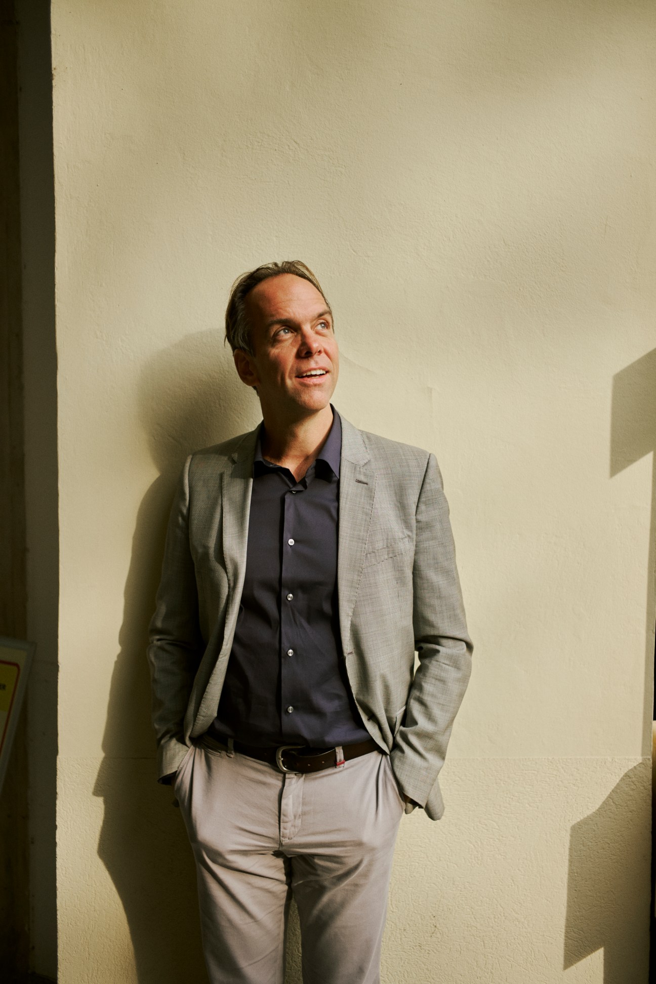 Portrait of Professor Markus Kornprobst sitting in his office at the Vienna School of International Studies