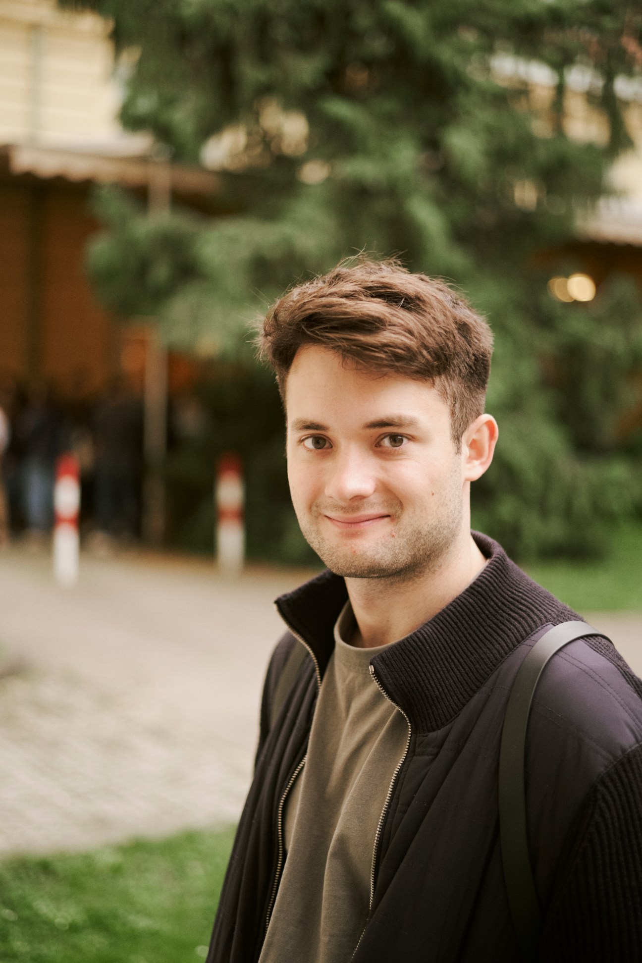Portrait of Will Slatton, a UK/US dual citizen student, in the academy building
