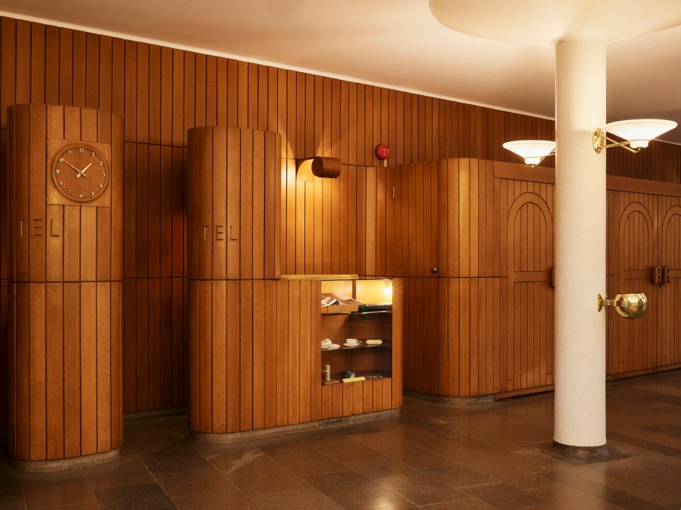 Vintage telephone booths in the civic hall, still functional and popular with guests for their sound-blocking properties