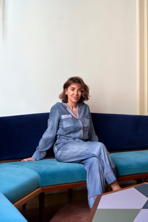 Anna Maria Enselmi, founder of Palazzo Luce, standing in her design hotel