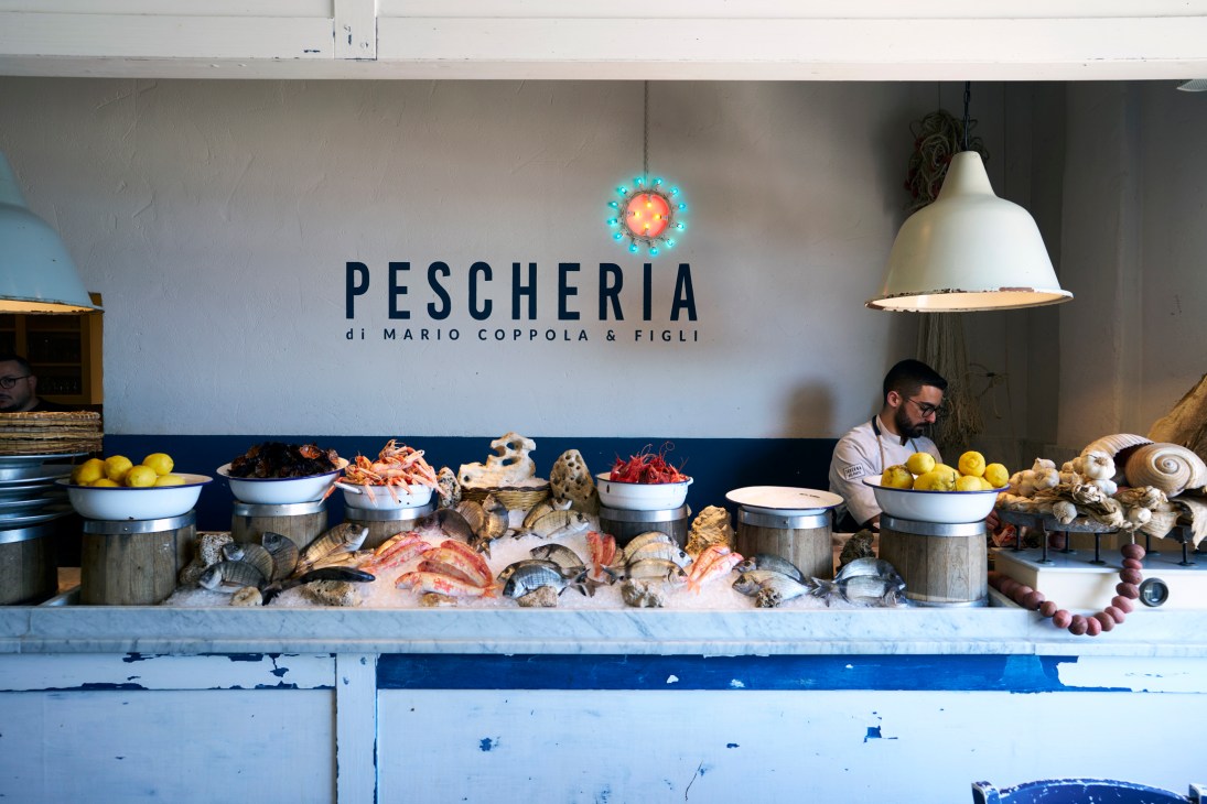 Traditional fish market stand displaying the day's fresh catch