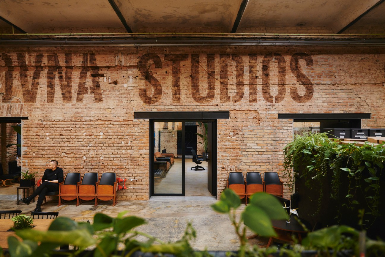 Interior view of Kabelovna Studios showing high ceilings, brick walls, and recording equipment