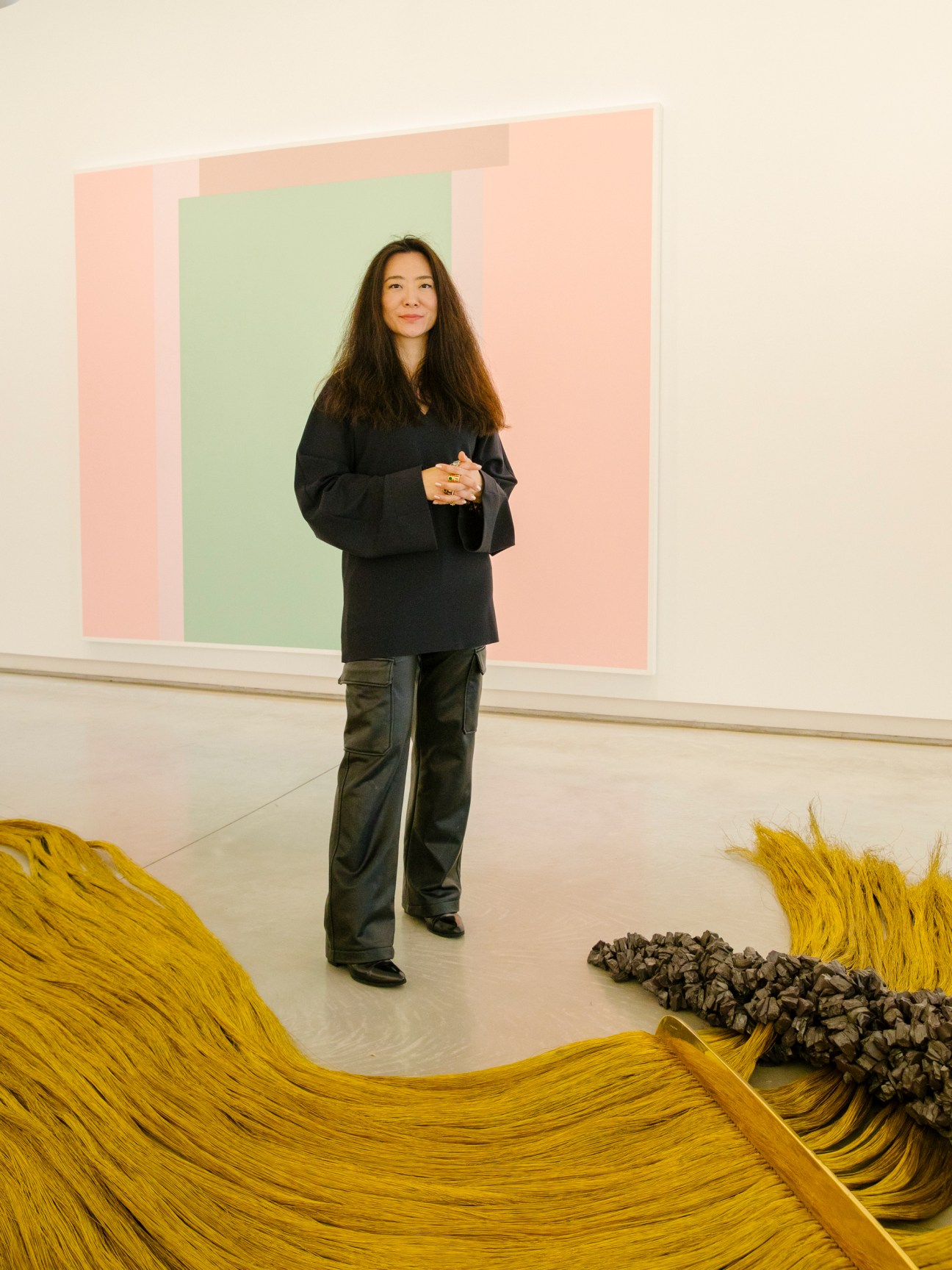 Hena Lee, general director of Galeria Millan, standing in her gallery