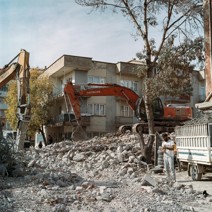 Collapsed apartment buildings and debris following earthquake in Elbistan
