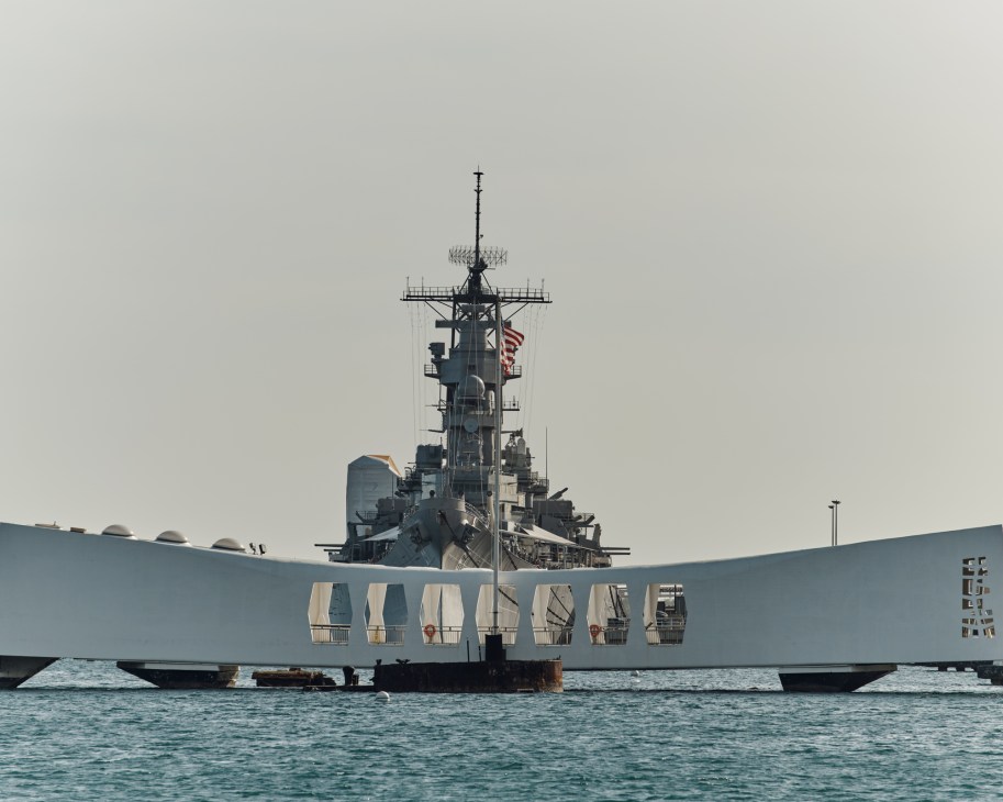 The USS Arizona memorial in front of the USS Missouri at Pearl Harbor