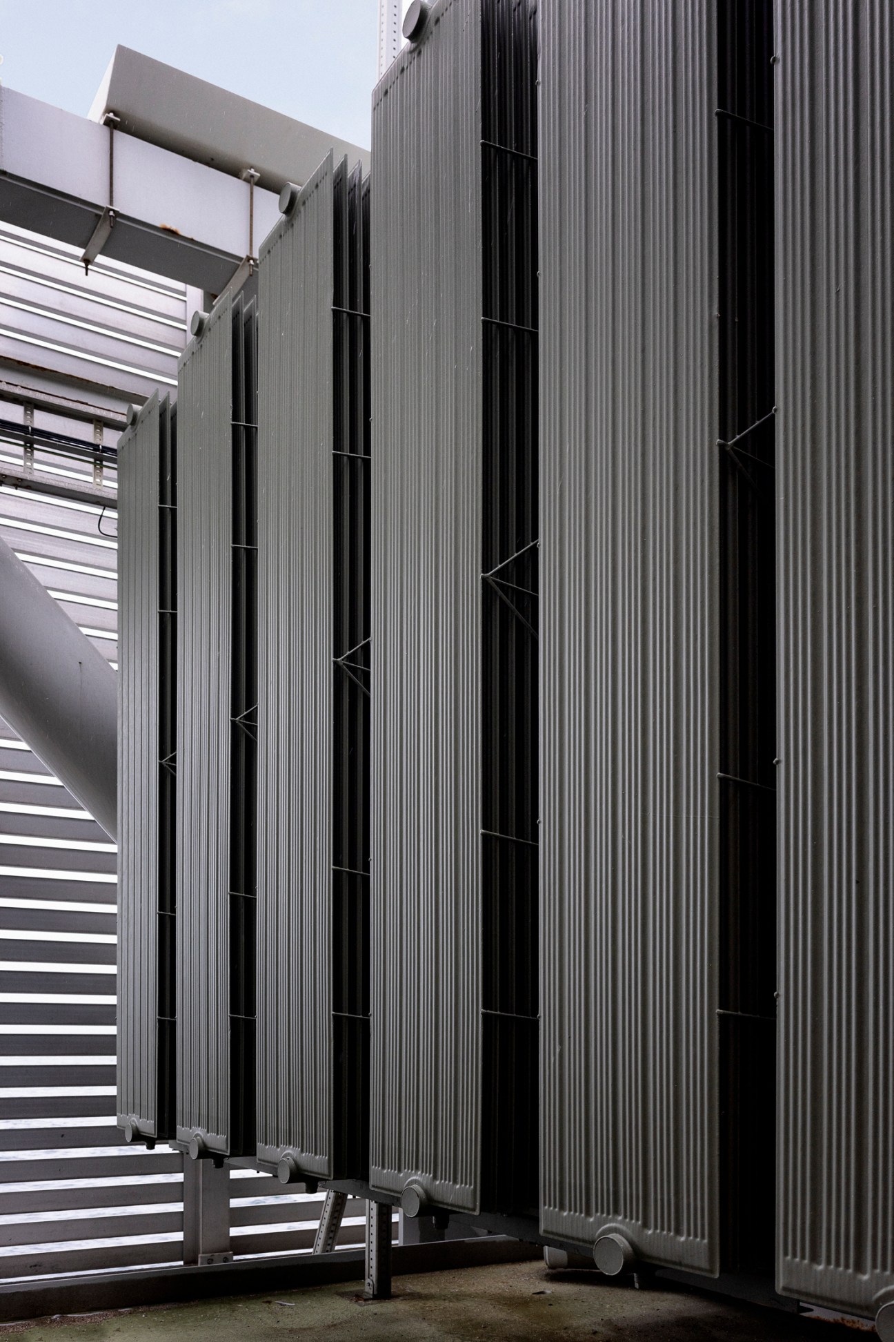 Worker climbing inside wind turbine tower