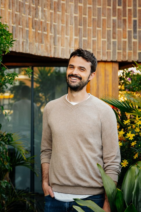 Vicente Benlloch Piles standing in a modernly renovated apartment interior