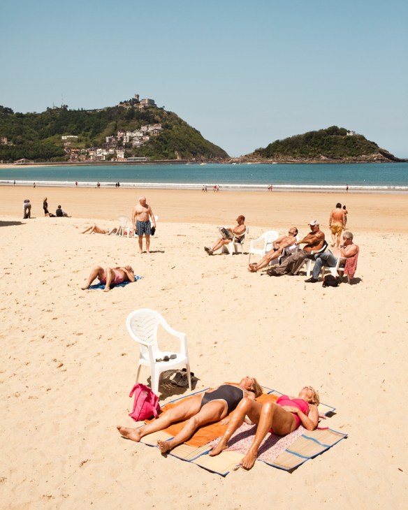 Beachfront promenade and buildings overlooking Playa de la Concha in San Sebastián