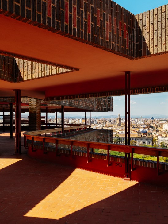 Rooftop terrace with laundry lines and urban views across Valencia