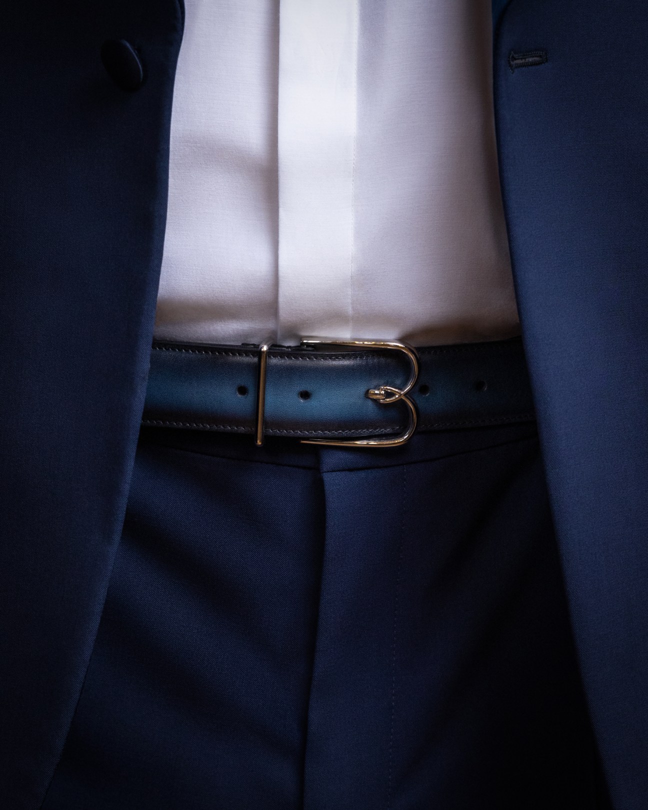 Close-up details of the Berluti uniforms