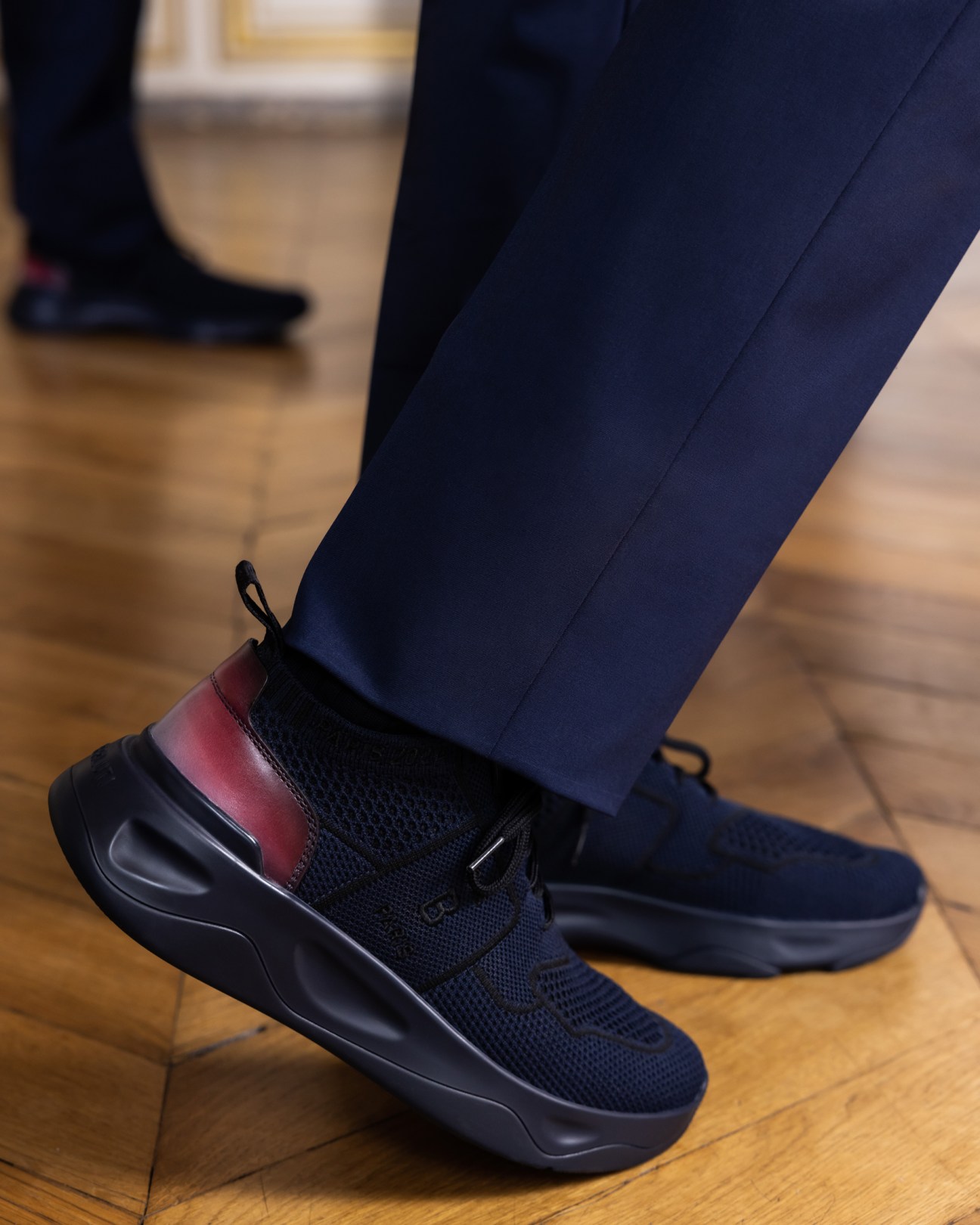 Berluti's signature Shadow trainers in navy blue
