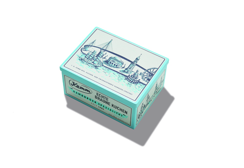 Kemm biscuit tin with turquoise and white design featuring Hamburg architecture