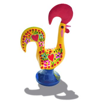 Colorful ceramic rooster figurine with yellow body and red comb, representing the Rooster of Barcelos.