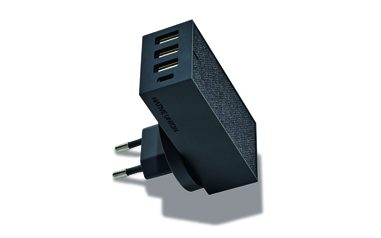 Native Union multi-USB wall charger with black casing and interchangeable plug adapters.