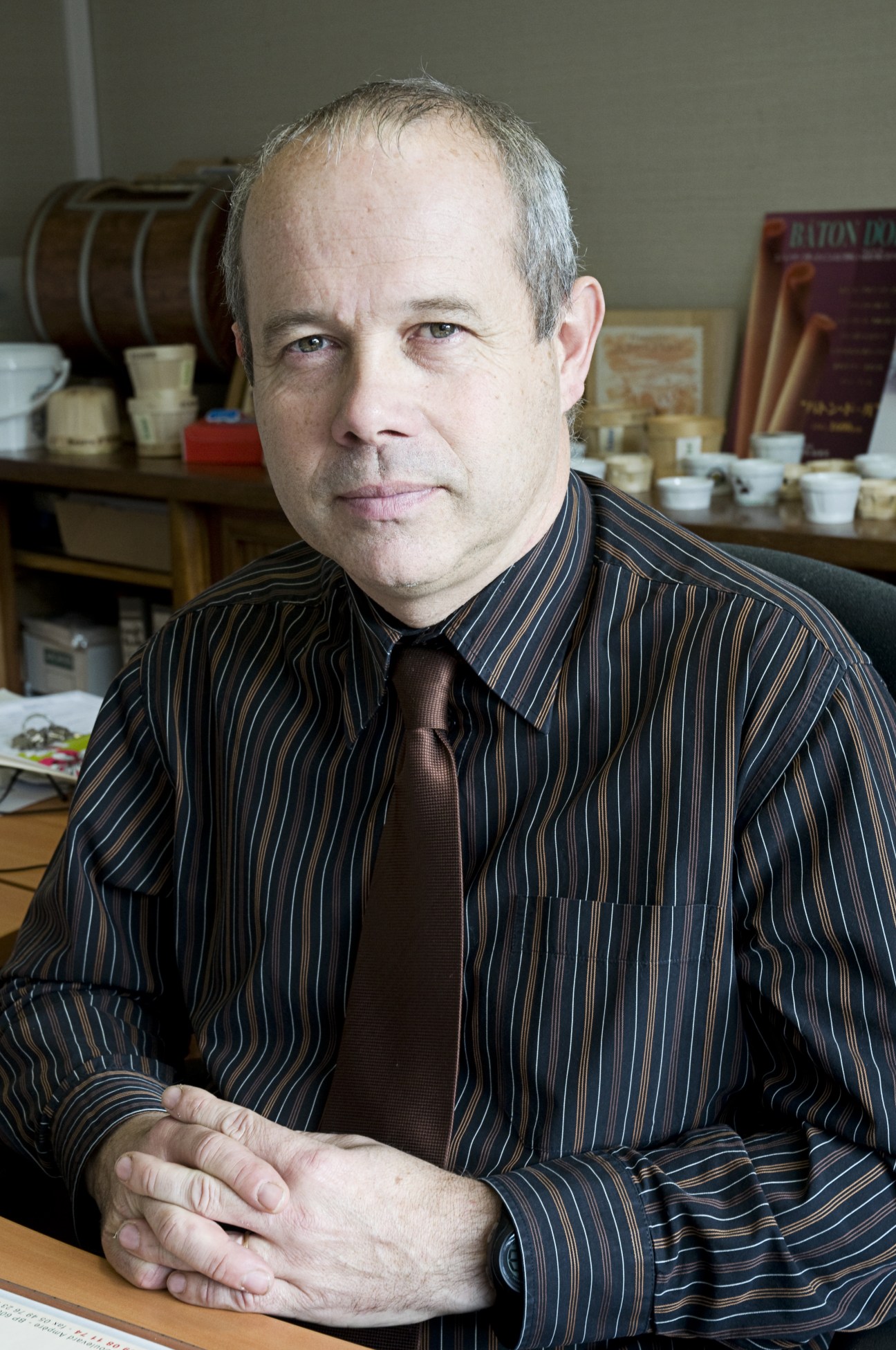 Florent Geay, commercial director of Echiré cooperative, seated at desk in office