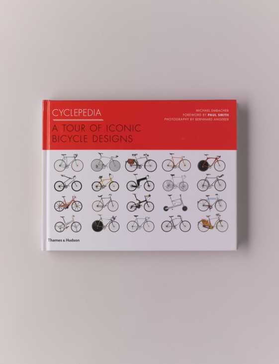 Cyclepedia book cover featuring 25 iconic bicycle designs on red and white background by Michael Embacher.