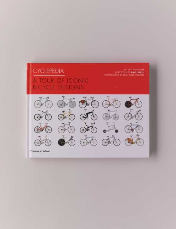 Cyclepedia book cover featuring 25 iconic bicycle designs on red and white background by Michael Embacher.