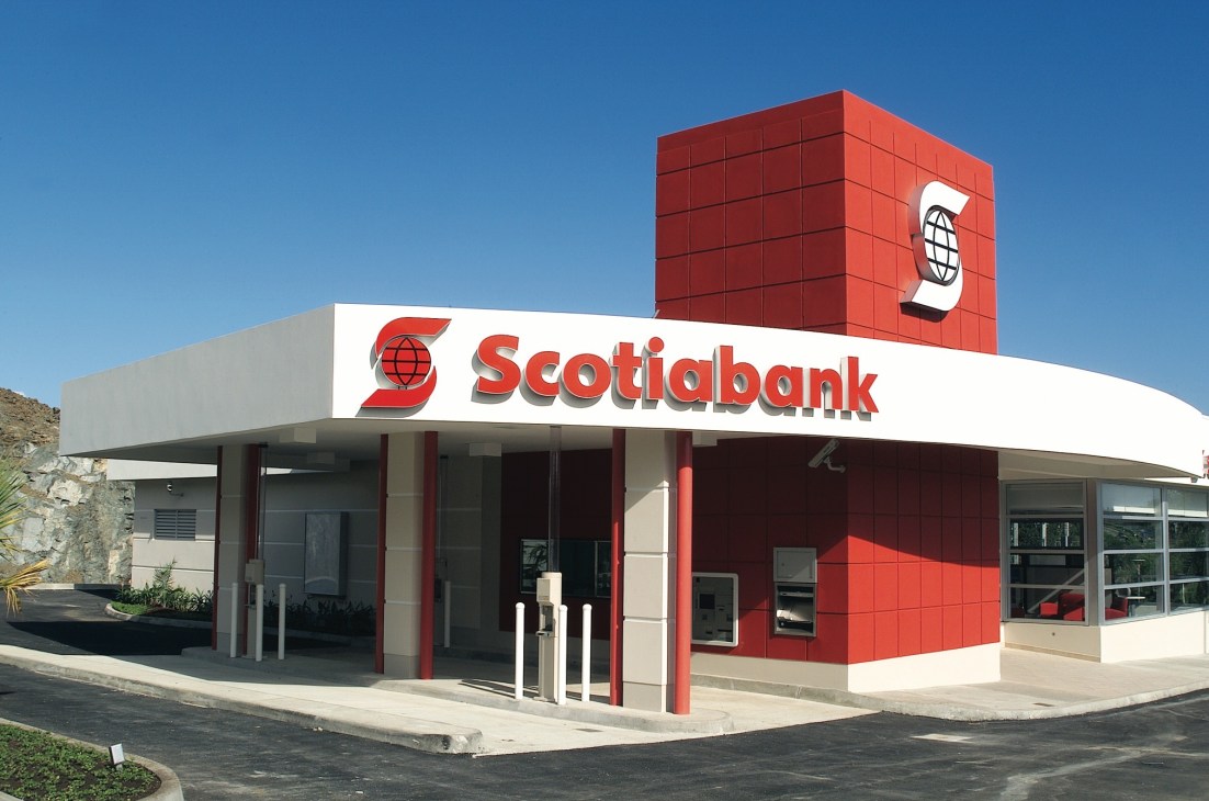 Scotiabank branch exterior with red and white modern architecture and globe logo.