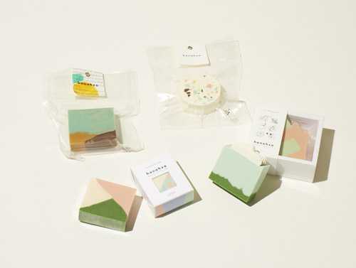 Colorful handmade soaps by Hanahzo featuring terrazzo designs in pastel shades with natural ingredients.