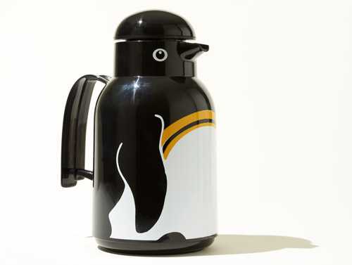 Black and white penguin-themed thermos with beak-shaped spout by Helios.
