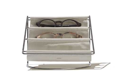 Hammock accessory organiser by Umbra with tiered fabric pockets holding sunglasses.