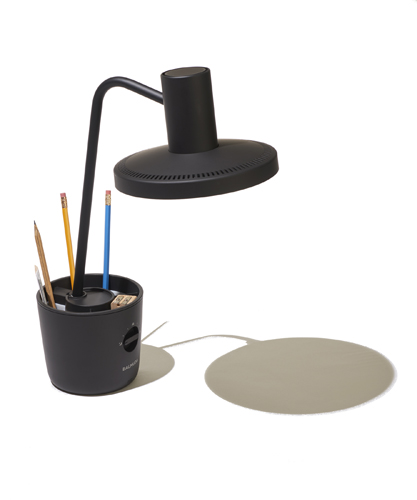 Balmuda desk light with integrated stationery storage compartment and adjustable black arm.