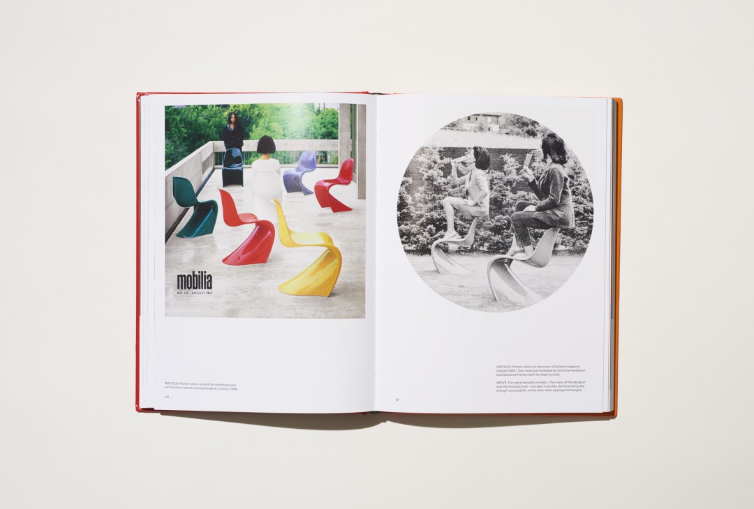 Open book showing Verner Panton designer monograph with colorful chair designs displayed on pages