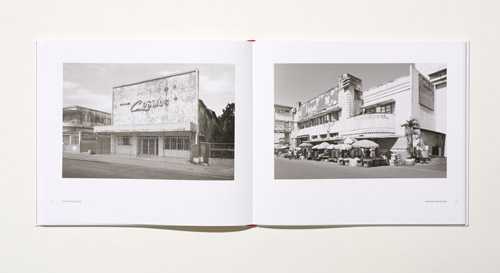 Open book showing two black and white photographs of modernist buildings from the Bauhaus era.