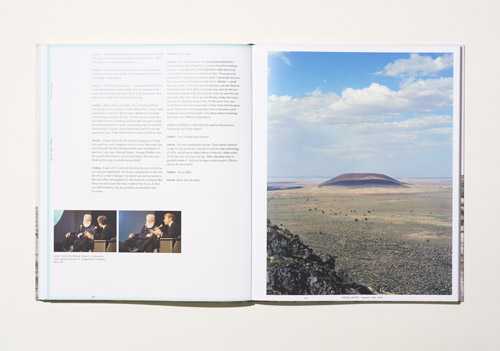 Open magazine spread showing article text on left page and landscape photograph of volcanic terrain on right page.