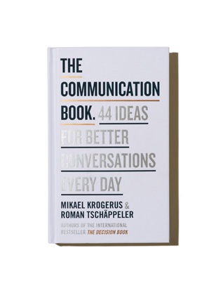 The Communication Book by Mikael Krogerus and Roman Tschäppeler with brown bookmark.