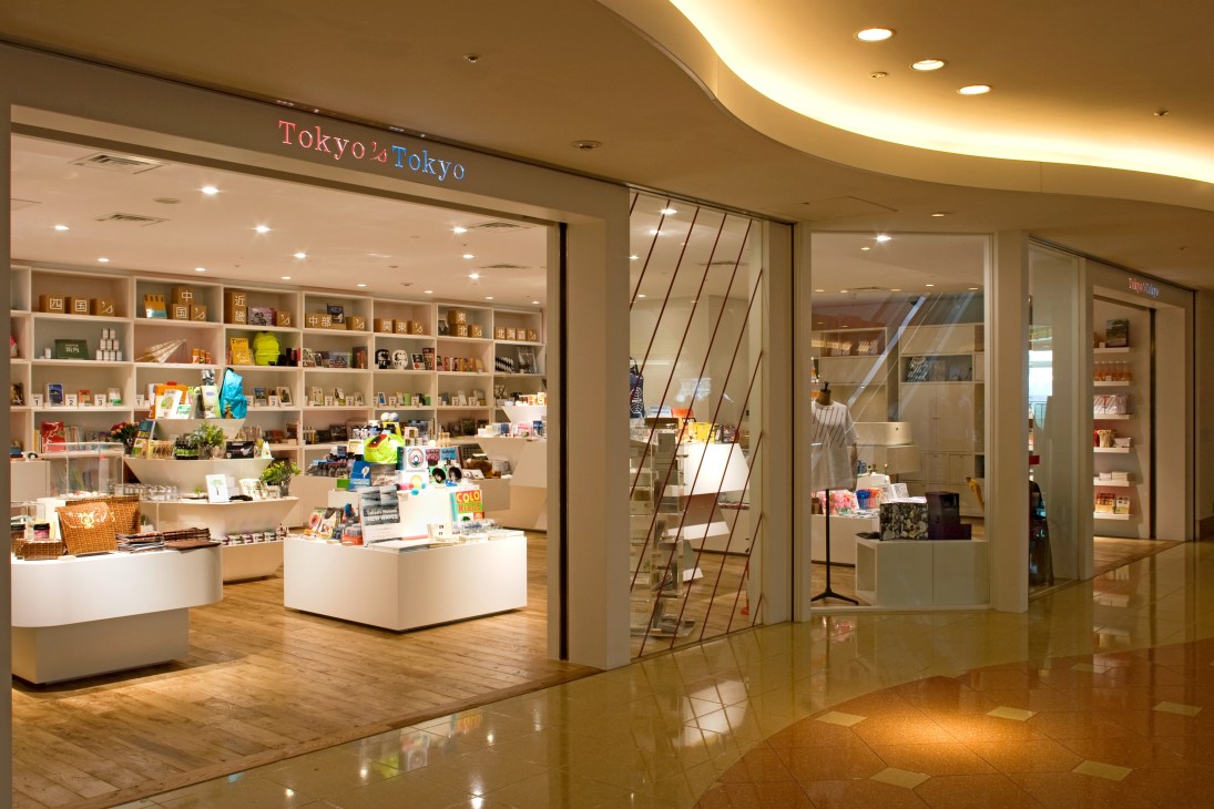 Tokyo's Tokyo airport gift shop storefront displaying curated merchandise including books, accessories and regional Japanese goods.