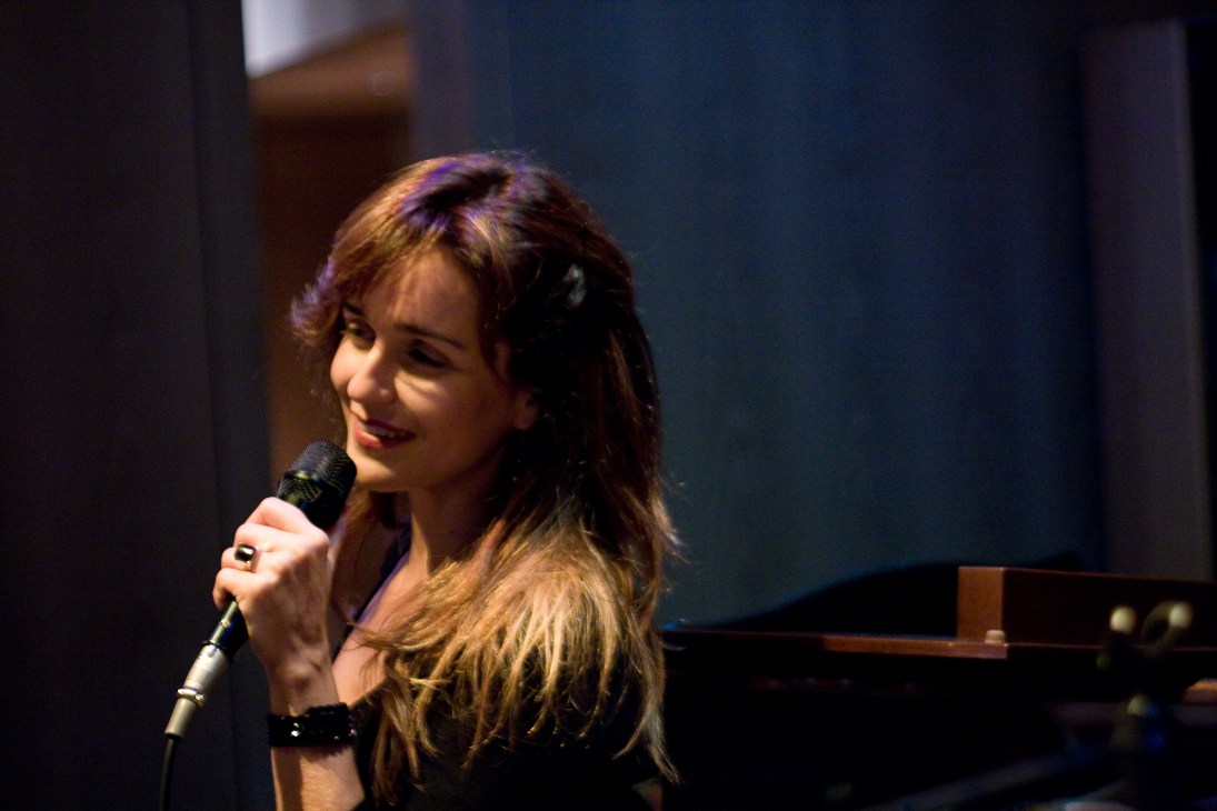 Brazilian singer Vanessa Falabella performs at the microphone in Maduro Bar at the Grand Hyatt Tokyo.