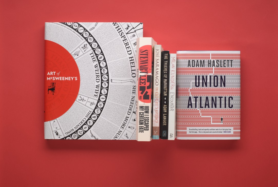 Books displayed against red background including Art of McSweeney's and Union Atlantic by Adam Haslett.