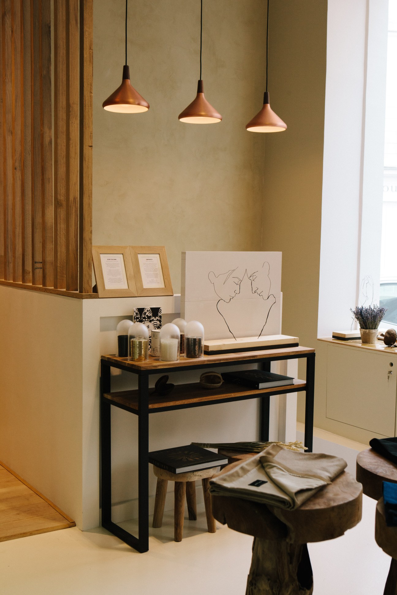 Maison Wattinne shop interior with wooden display fixtures and natural materials in Paris