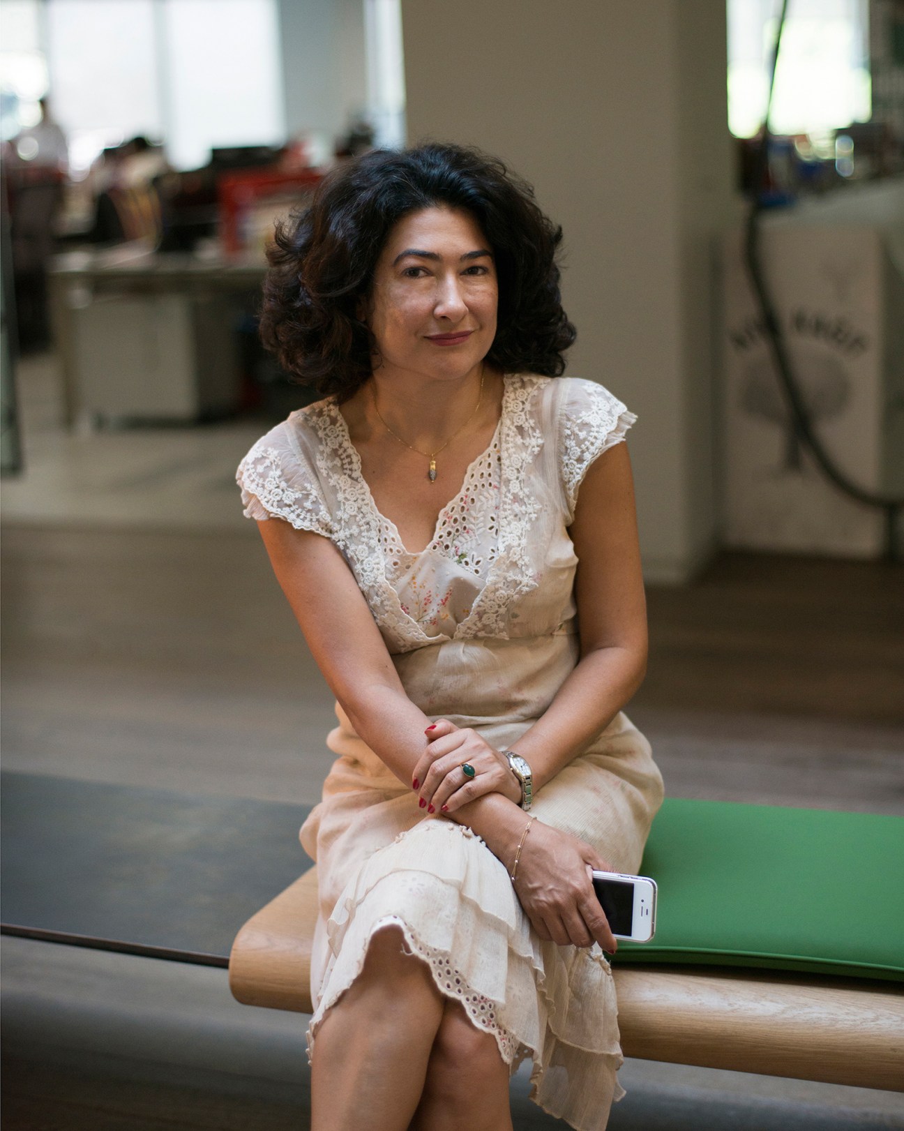 Barcin Yinanc, opinion editor and senior columnist at Hurriyet, seated in an office.