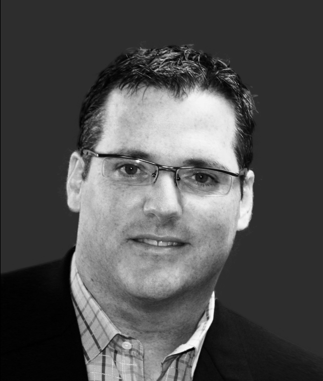 Black and white portrait photograph of Dan Gilmartin, CEO and executive director of Michigan Municipal League.