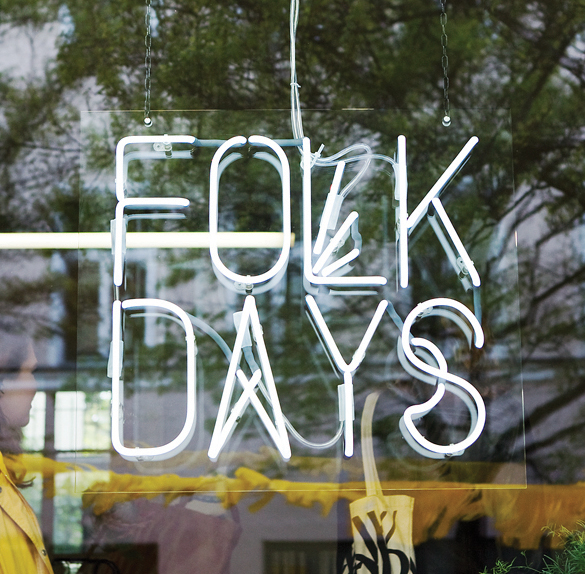 Interior of Folkdays shop in Berlin showing artisanal textiles and handcrafted goods