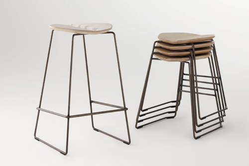 Ross Gardam Duet stacking bar stools with powder-coated metal frames and wooden seats.