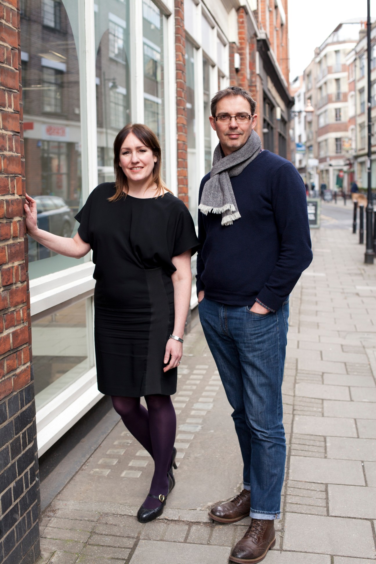 Susie Babchick and Steve Macleod, co-curators of Photo Art Fair, standing on a London street.