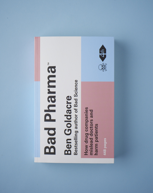 Book cover of 'Bad Pharma' by Ben Goldacre featuring pink and blue sections on a light blue background.