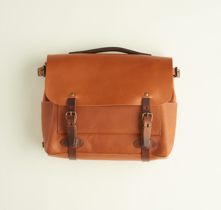 Tan grain-leather satchel bag with darker brown straps and buckles from Bleu de Chauffe.