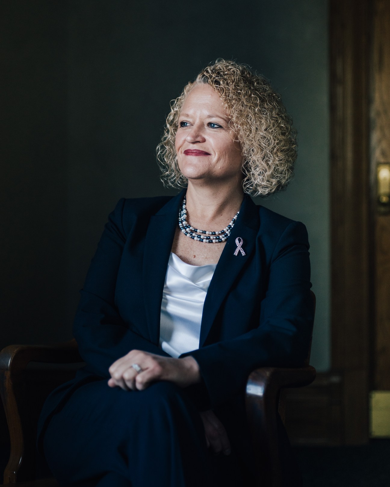 Jackie Biskupski, mayor of Salt Lake City, wearing a dark blazer and beaded necklace.