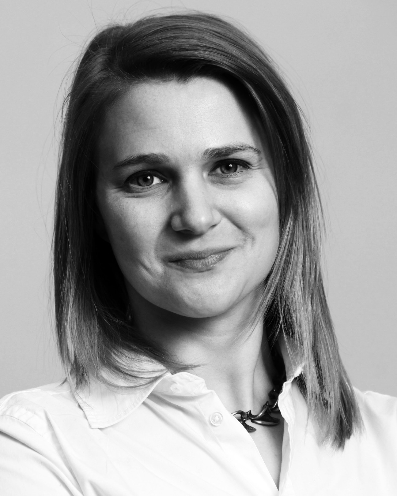 Black and white portrait photograph of Charlotte McDonald-Gibson, Brussels correspondent for Monocle.