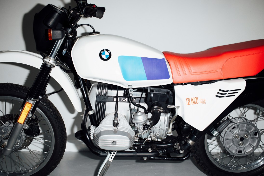 BMW R80 G/S motorcycle in white and orange with blue stripe on fuel tank