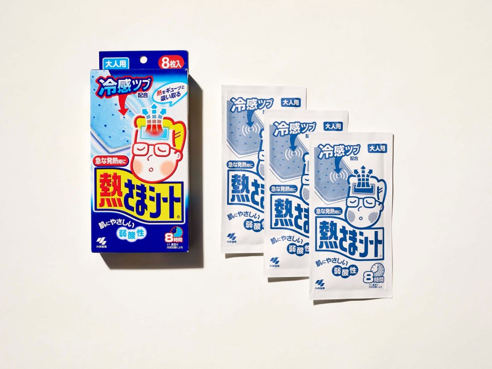 Japanese cooling facial gel strips in blue and white packaging with cartoon character design.