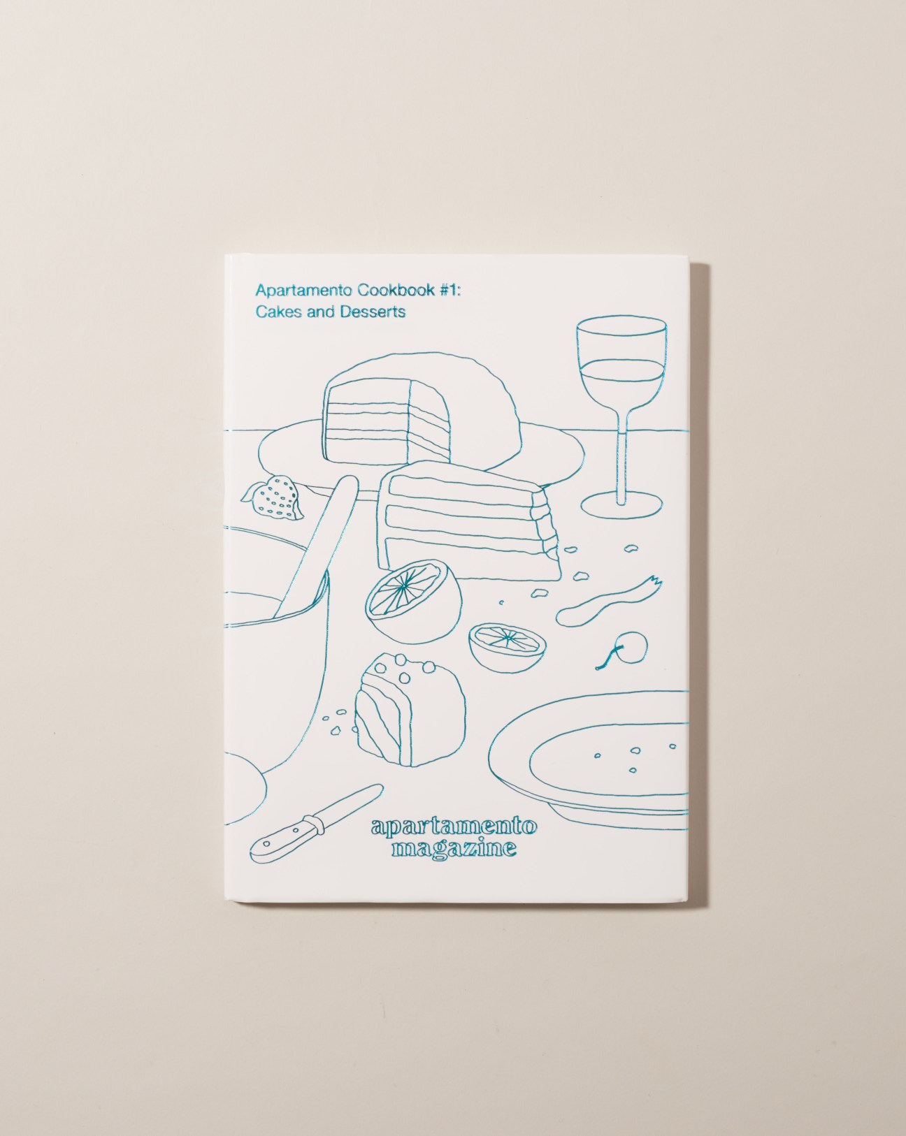 Apartamento Cookbook #1: Cakes and Desserts cover with blue line drawings of desserts and tableware