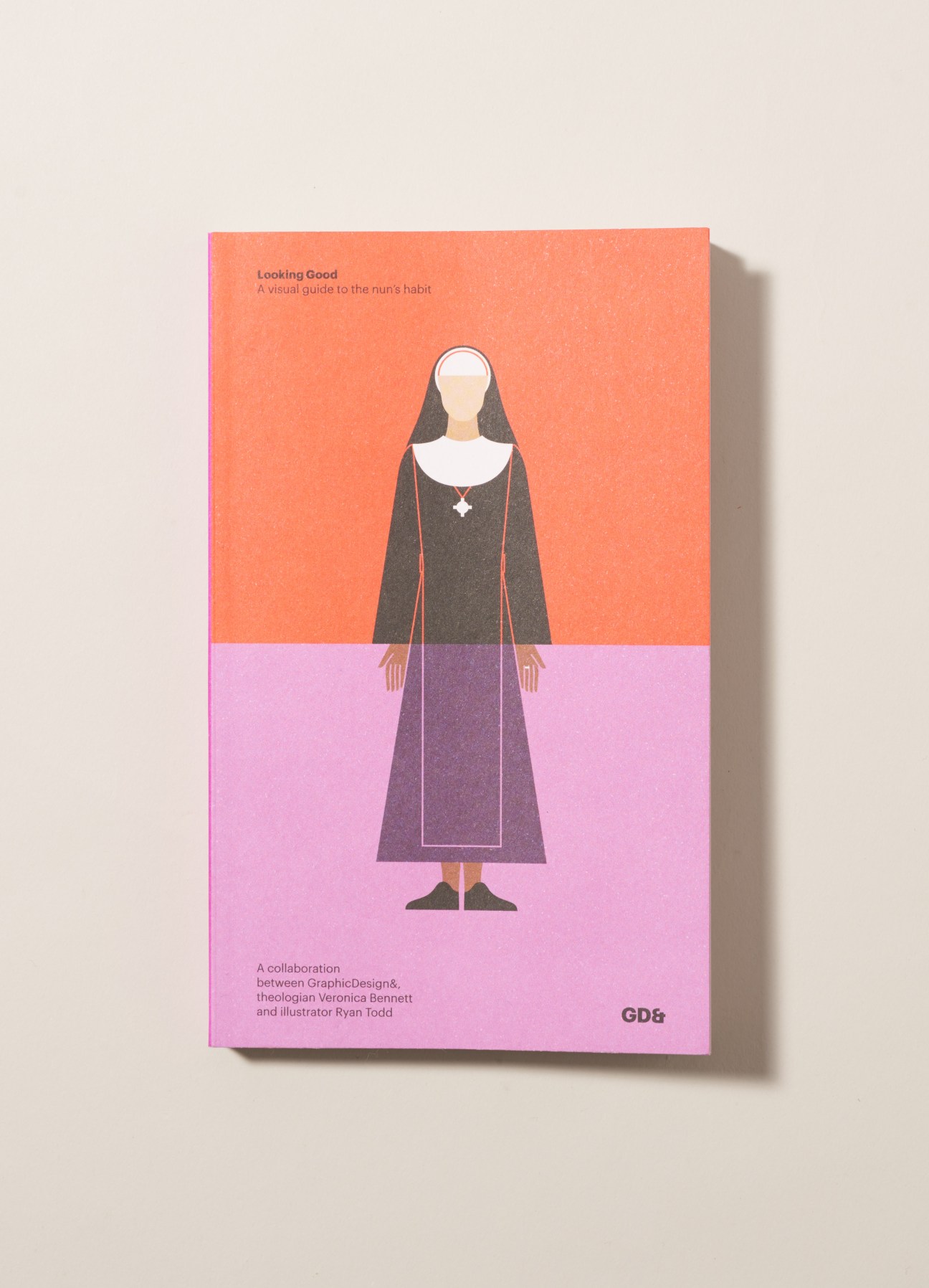 Looking Good book cover featuring illustrated nun in black habit on coral and pink background