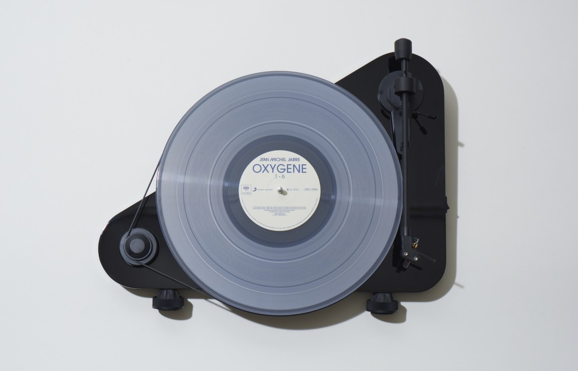 Pro-Ject VT-E BT upright record player with vinyl record playing Jean Michel Jarre's Oxygene.