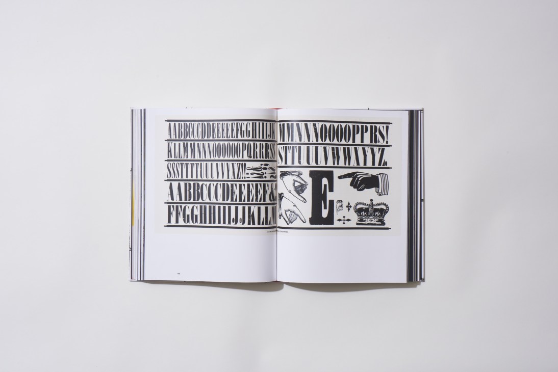 Open book showing typography and letterpress designs by Alan Kitching.